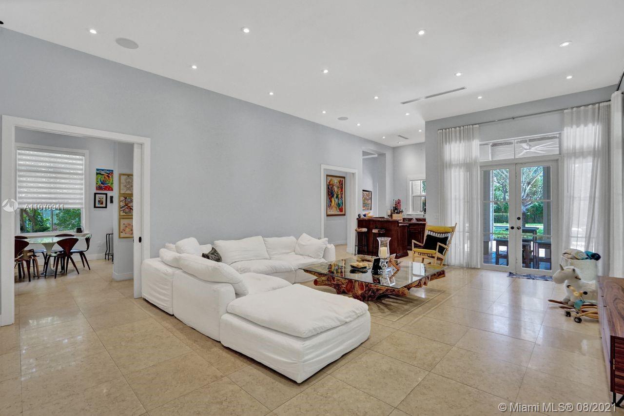 12260 Southwest 95th Avenue Miami, FL 33176 - Photo 63 of 98 a living room with furniture and large windows