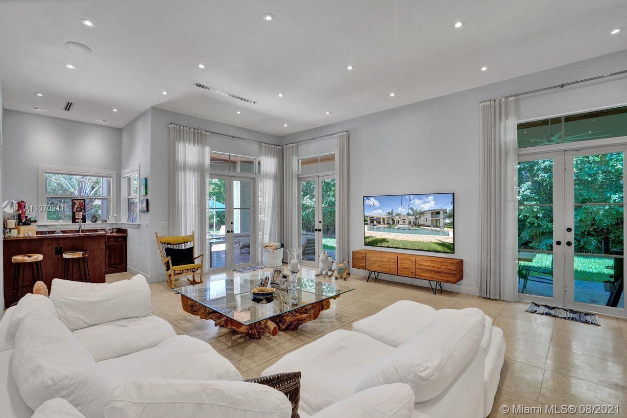 12260 Southwest 95th Avenue Miami, FL 33176 - Photo 64 of 98 a living room with furniture and a large window