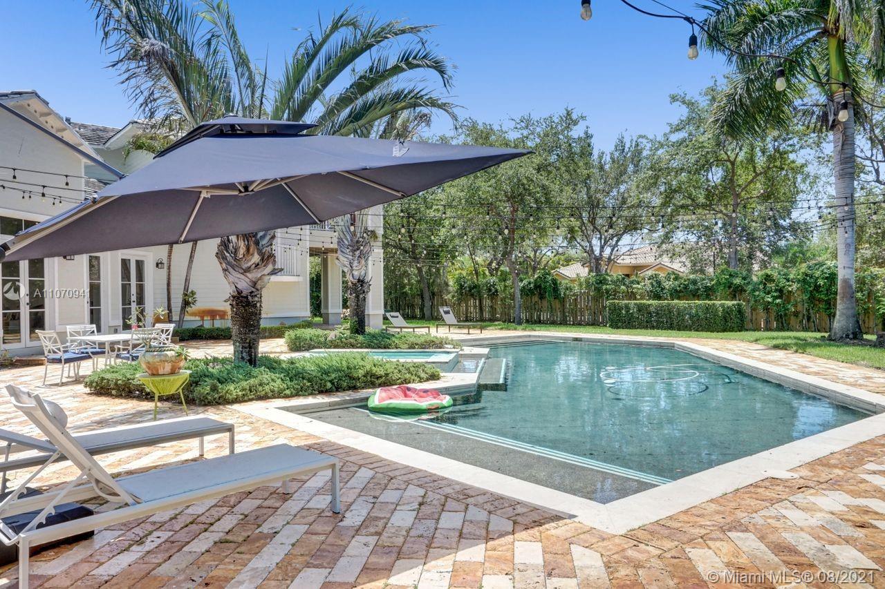 12260 Southwest 95th Avenue Miami, FL 33176 - Photo 80 of 98 a view of a swimming pool with a patio
