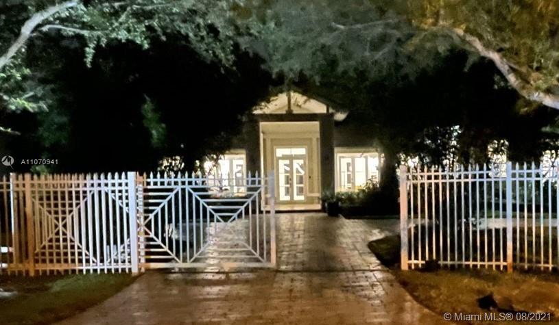 12260 Southwest 95th Avenue Miami, FL 33176 - Photo 92 of 98 a front view of a house with a porch