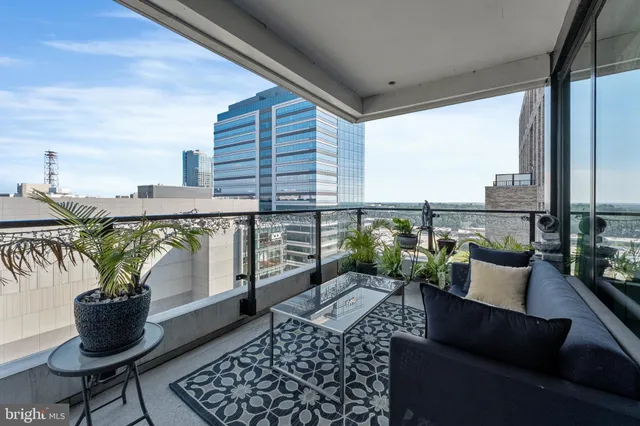 a view of balcony with furniture