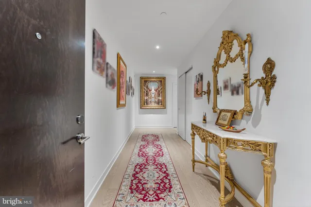 a view of a hallway with windows