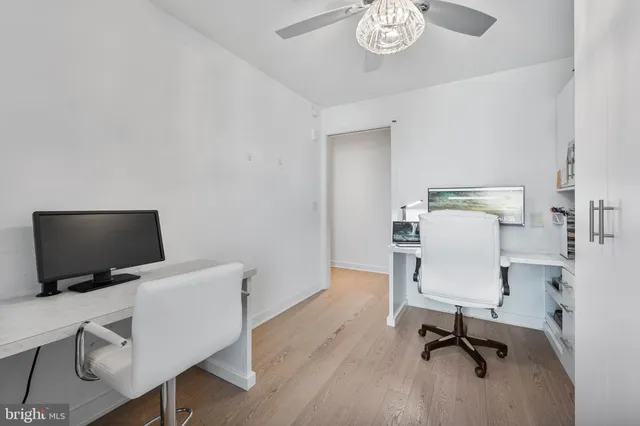 a picture of a bathroom with a shower