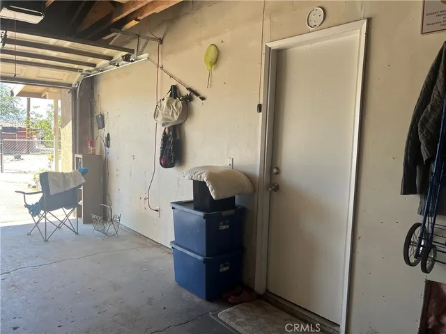 a room with window and a ceiling fan