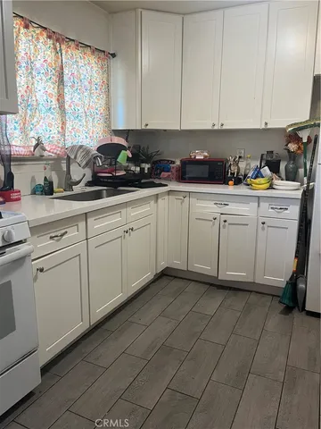 a view of a street with an outdoor space