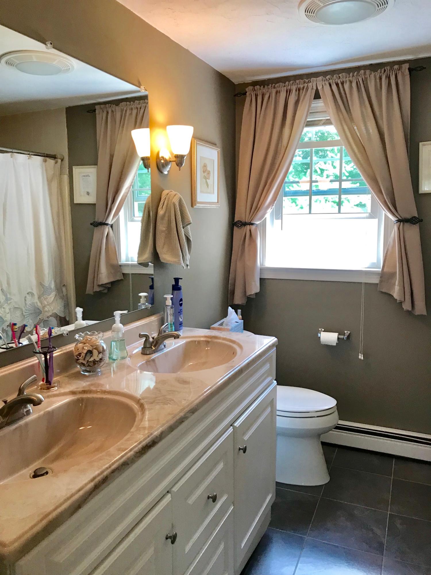 44 Pimlico Pond Road Forestdale, MA 02644 - Photo 14 of 28 a bathroom with a toilet sink and mirror