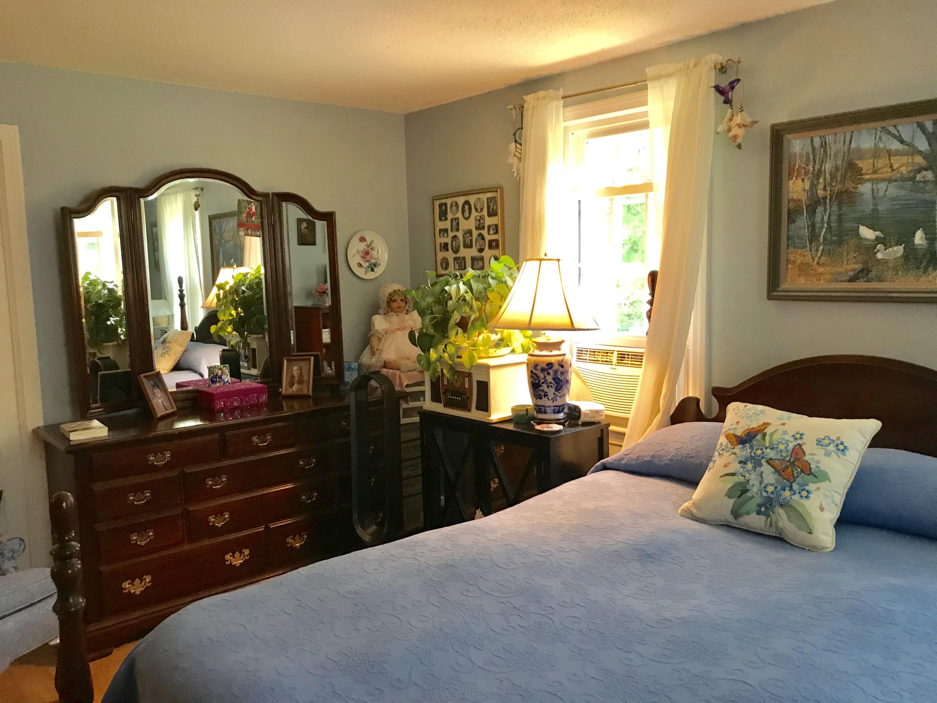 44 Pimlico Pond Road Forestdale, MA 02644 - Photo 16 of 28 a bedroom with a bed and a mirror on dresser