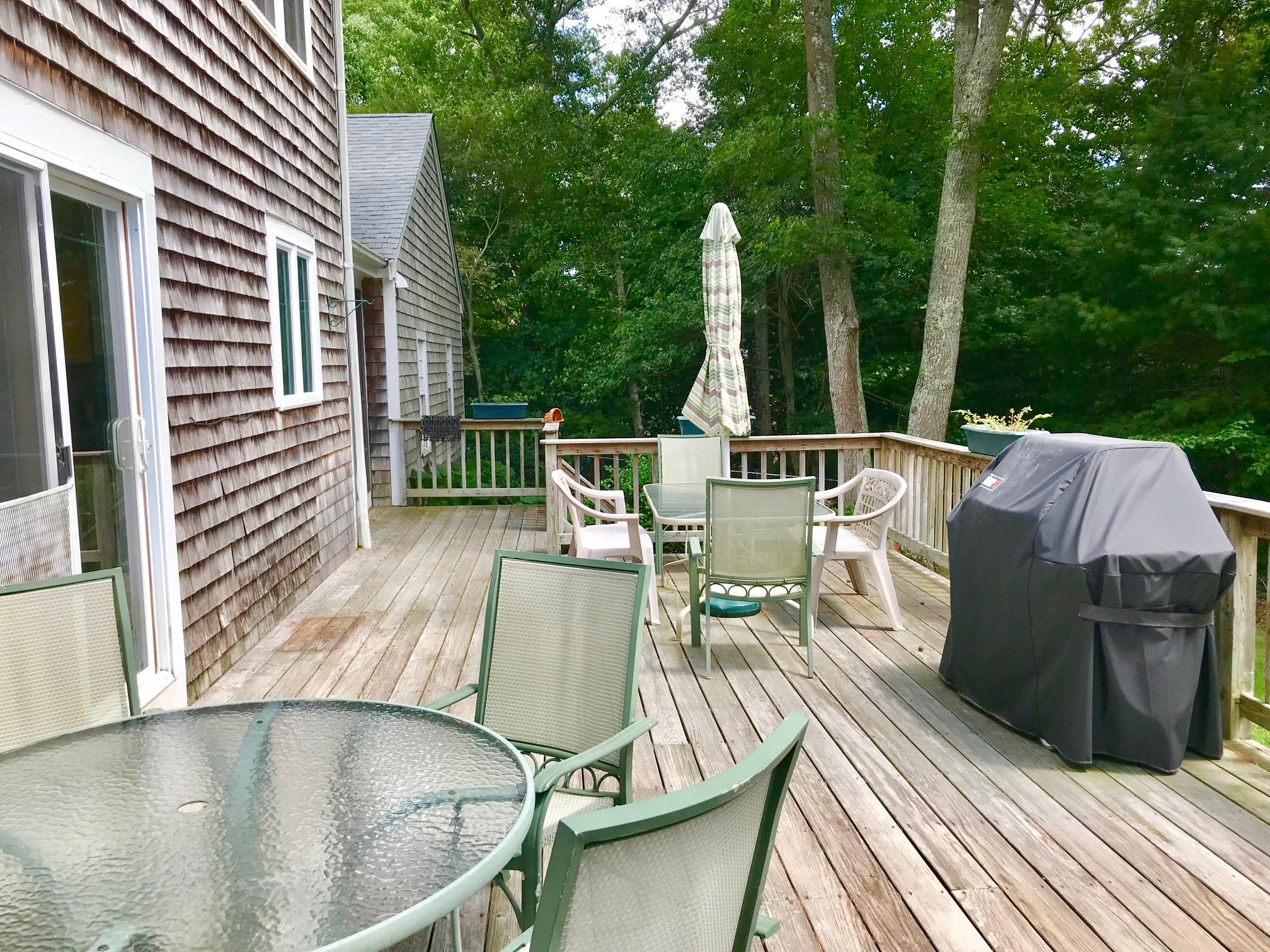 44 Pimlico Pond Road Forestdale, MA 02644 - Photo 24 of 28 a view of balcony with furniture and garden