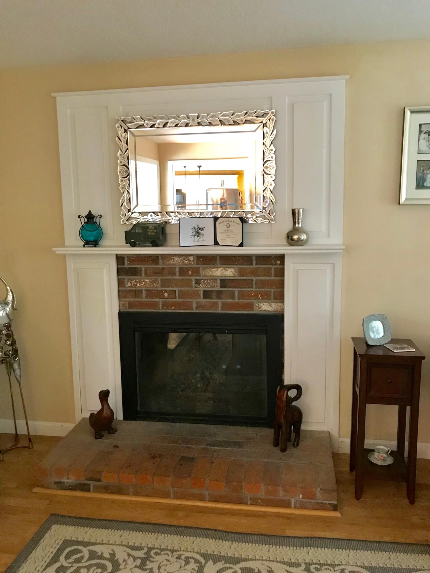 44 Pimlico Pond Road Forestdale, MA 02644 - Photo 6 of 28 a fireplace with a sink and a mirror