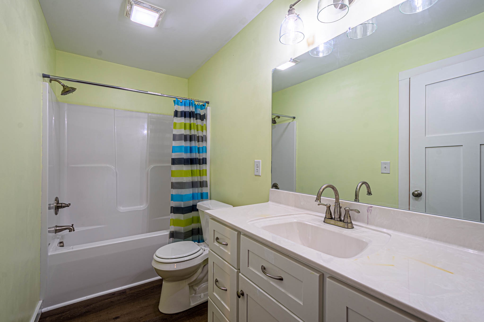 493 Powell Chapel Road Pulaski, TN 38478 - Photo 15 of 35 a bathroom with a sink a toilet and shower