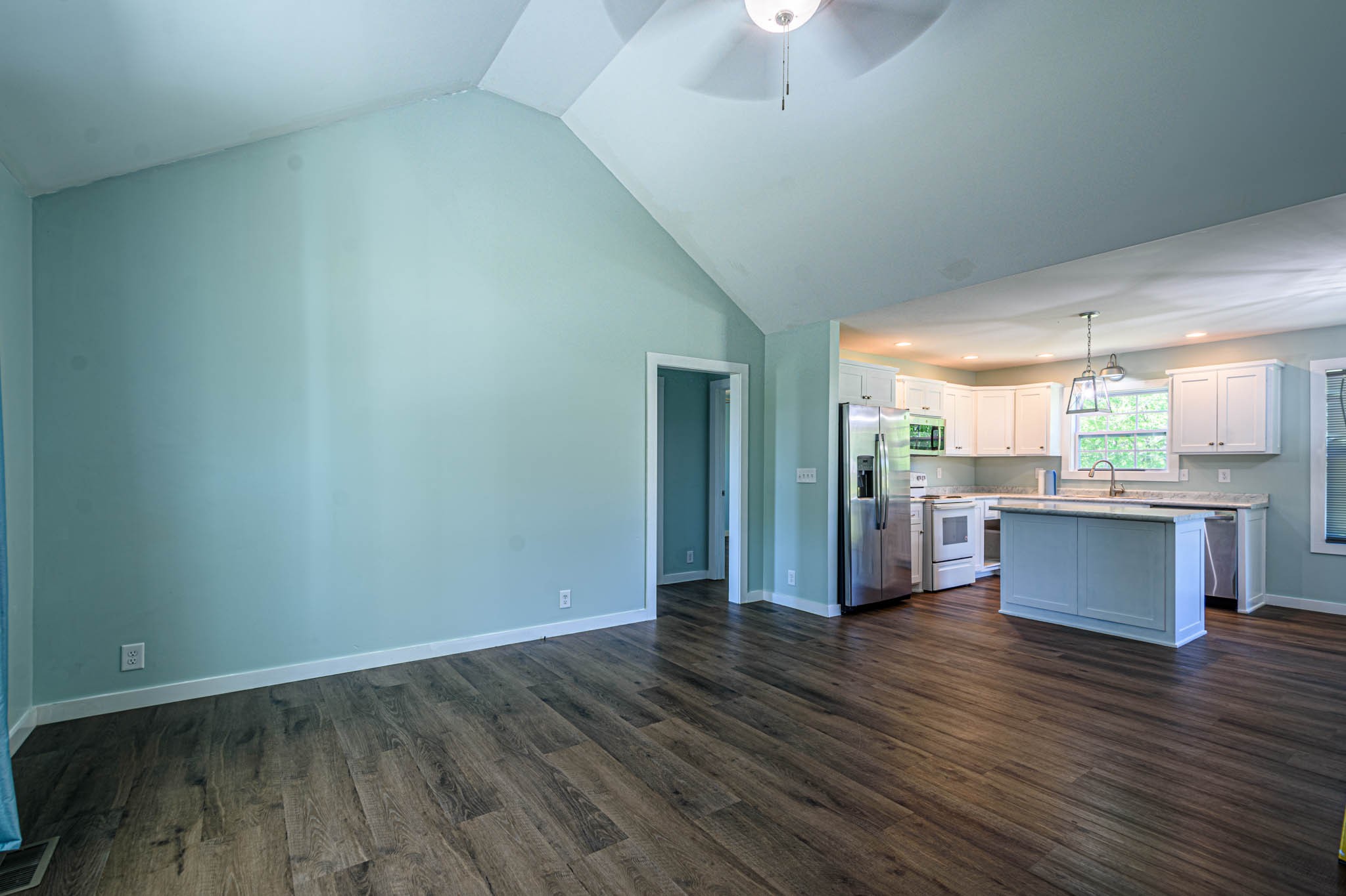 493 Powell Chapel Road Pulaski, TN 38478 - Photo 3 of 35 a view of kitchen with wooden floor and electronic appliances