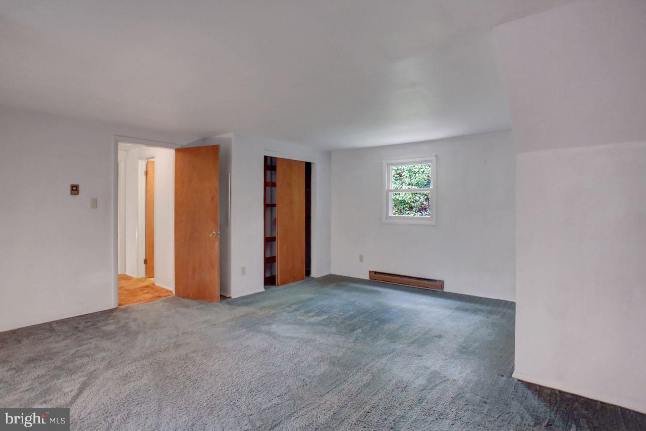 721 Narrows Road Biglerville, PA 17307 - Photo 23 of 40 an empty room with windows and closet