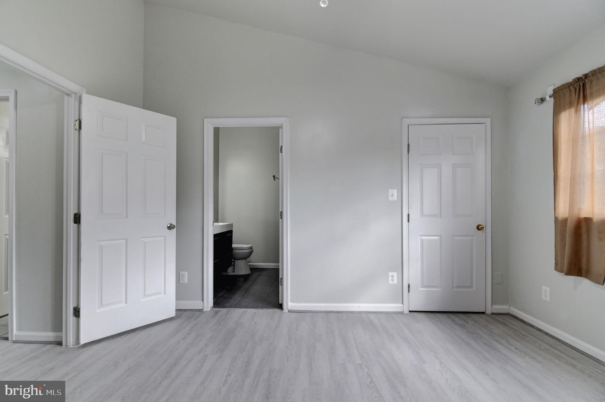 4013 Mammoth Cave Loop Dumfries, VA 22025 - Photo 17 of 38 a view of an empty room with closet and a window