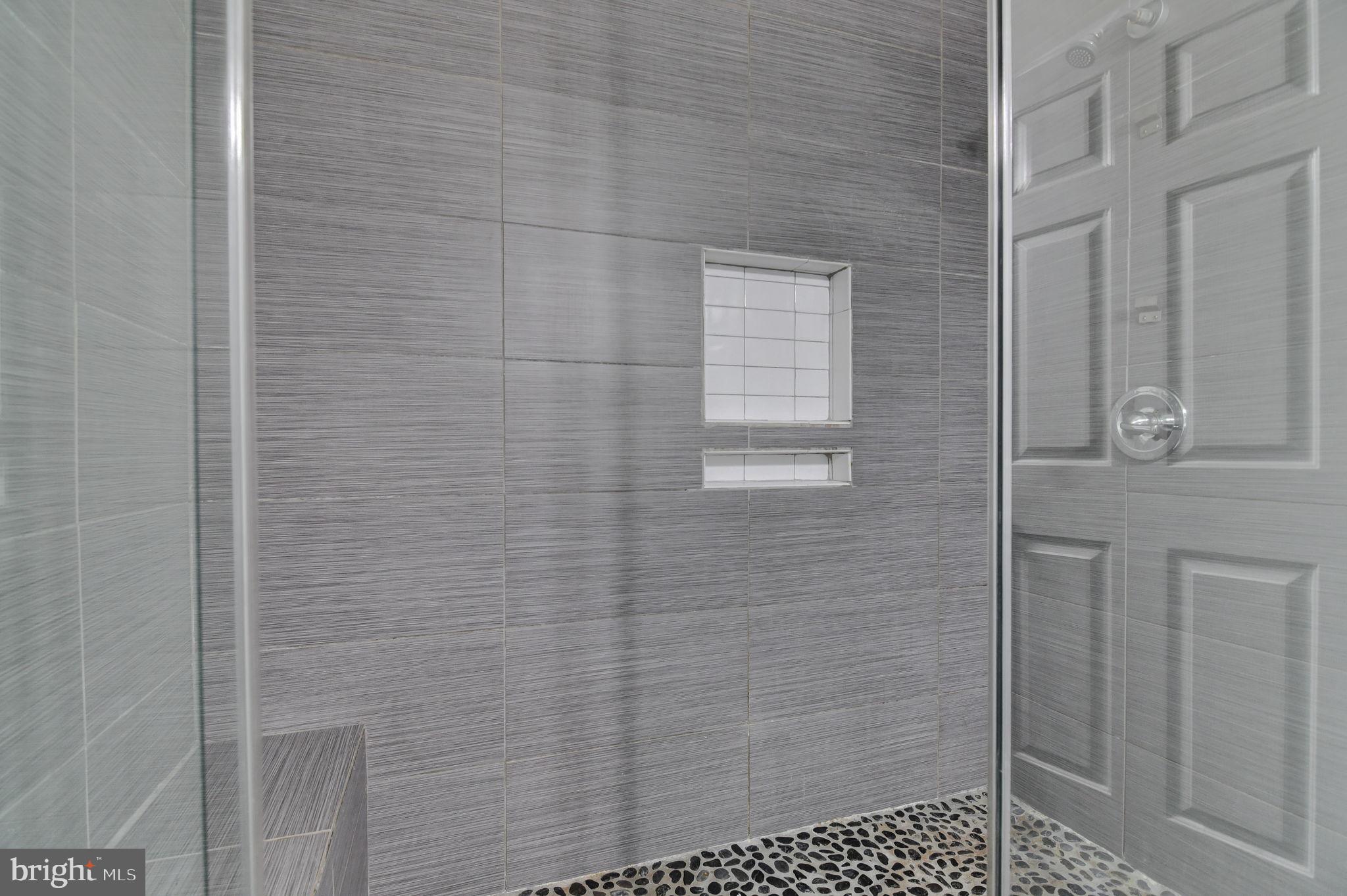 4013 Mammoth Cave Loop Dumfries, VA 22025 - Photo 20 of 38 a bathroom with a shower