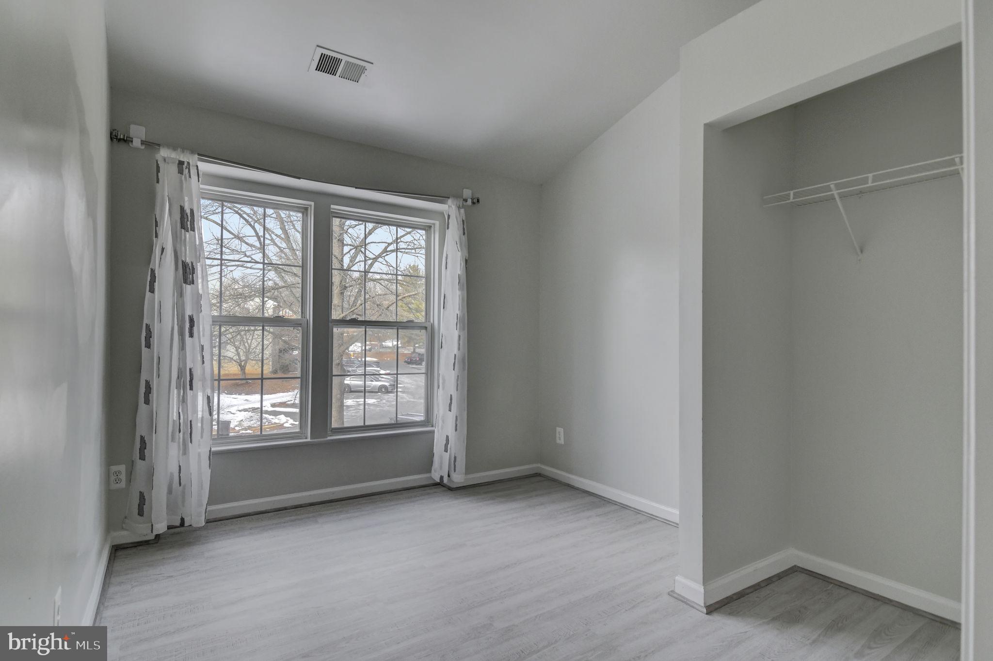 4013 Mammoth Cave Loop Dumfries, VA 22025 - Photo 24 of 38 an empty room with windows
