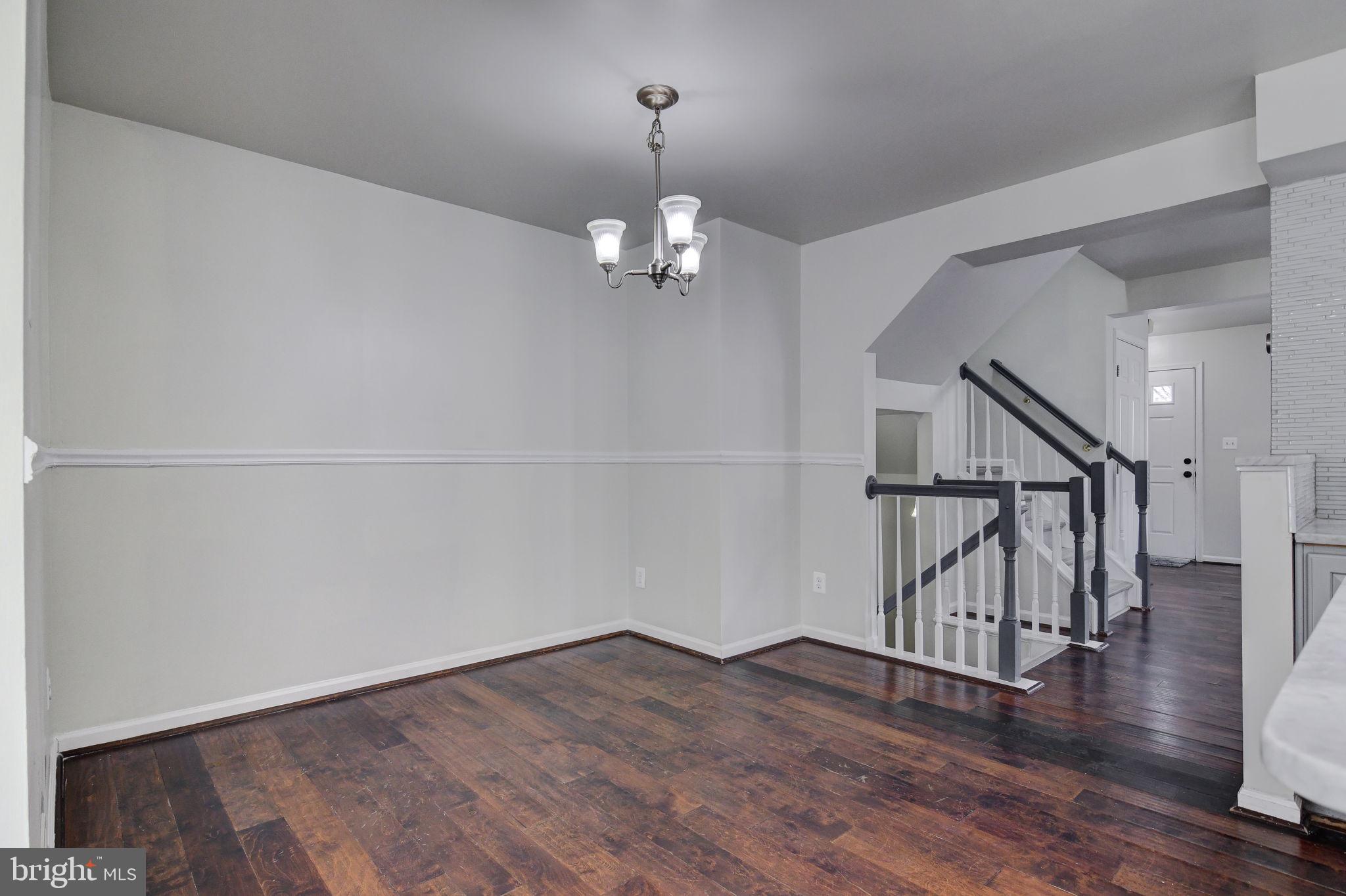 4013 Mammoth Cave Loop Dumfries, VA 22025 - Photo 10 of 38 a view of entryway with wooden floor