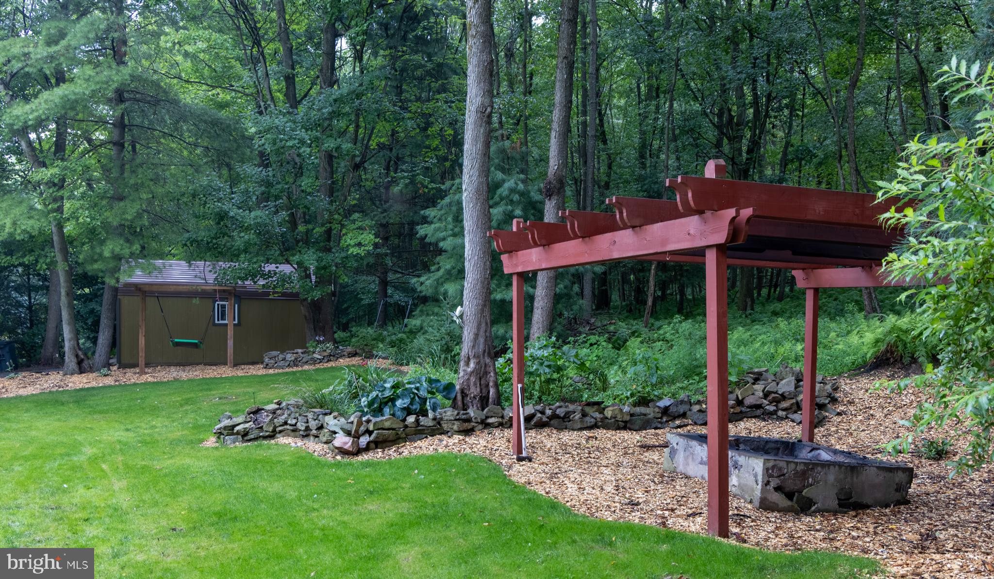 348 Decker Valley Road Spring Mills, PA 16875 - Photo 25 of 28 Serene woodland retreat with pergola.