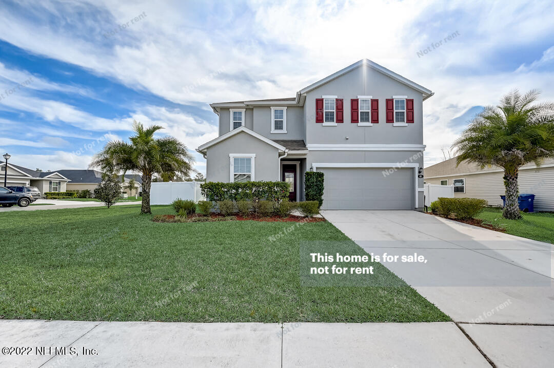 a house view with a garden space