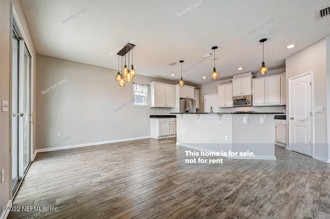 68 Redland Way Jacksonville, FL 32218 - Photo 11 of 36 a view of kitchen with wooden floor