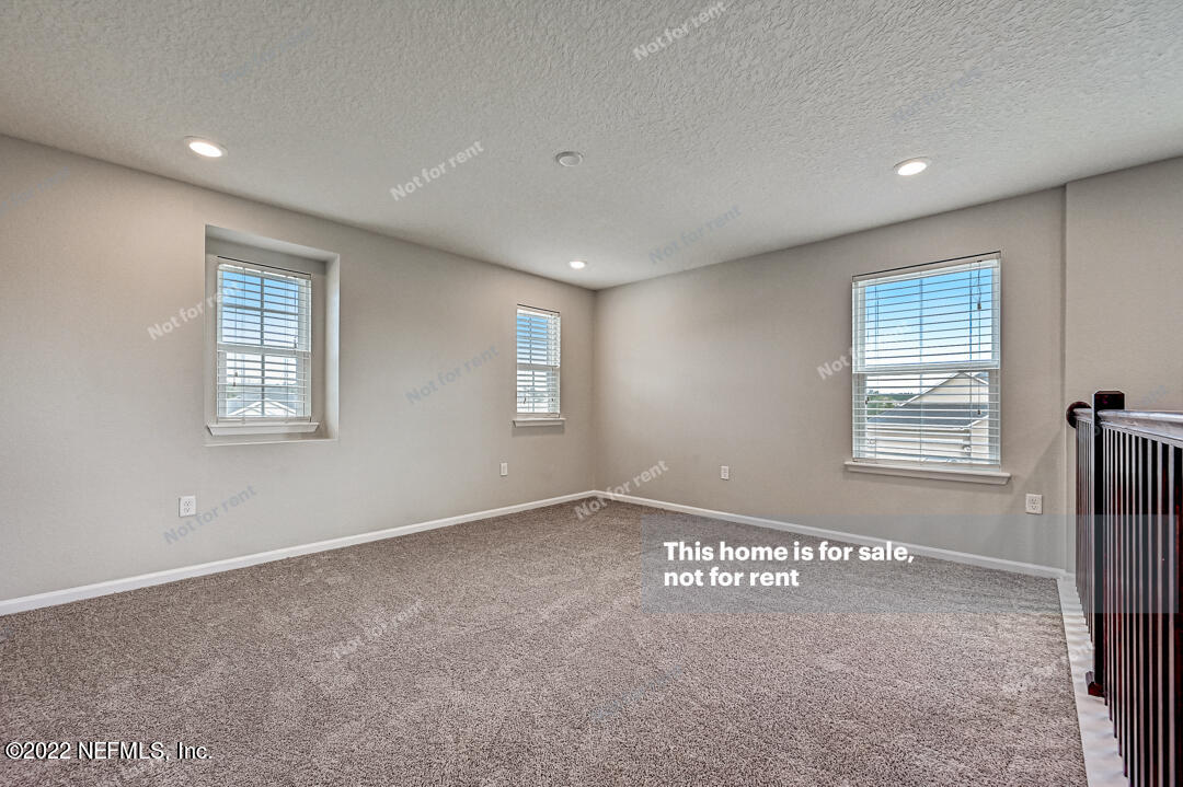 68 Redland Way Jacksonville, FL 32218 - Photo 16 of 36 a view of an empty room with a window