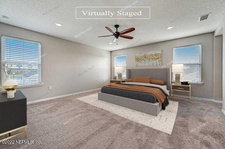 68 Redland Way Jacksonville, FL 32218 - Photo 18 of 36 a bedroom with a bed and window