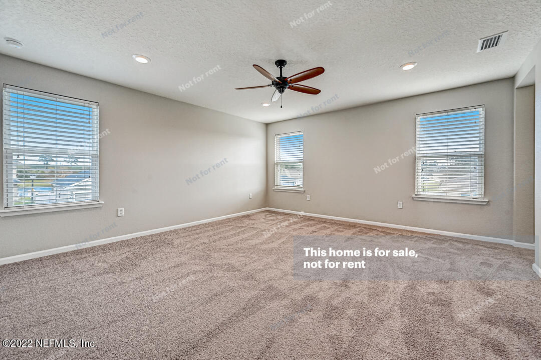 68 Redland Way Jacksonville, FL 32218 - Photo 19 of 36 a view of an empty room with a window