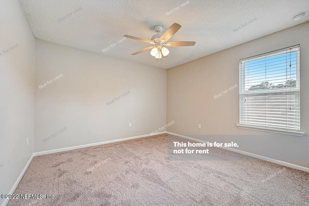 68 Redland Way Jacksonville, FL 32218 - Photo 21 of 36 a view of an empty room with a window