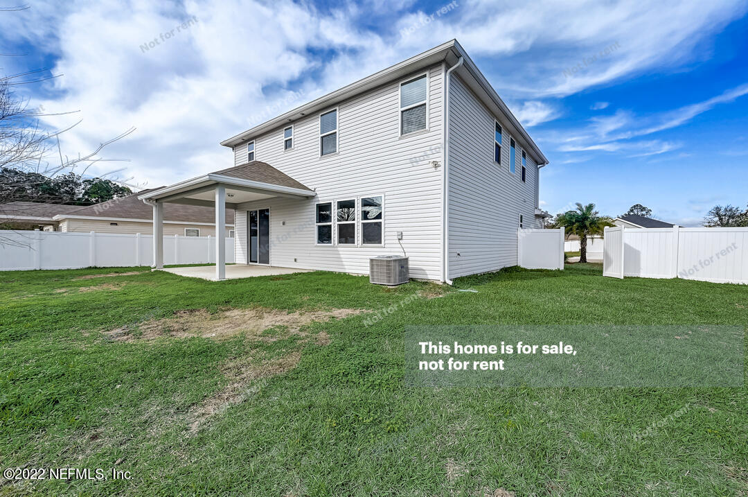 68 Redland Way Jacksonville, FL 32218 - Photo 33 of 36 a view of a house with a yard