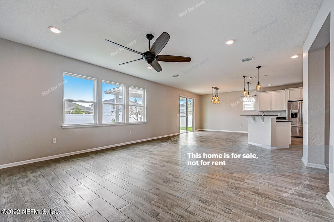 68 Redland Way Jacksonville, FL 32218 - Photo 7 of 36 a view of kitchen with cabinets and wooden floor