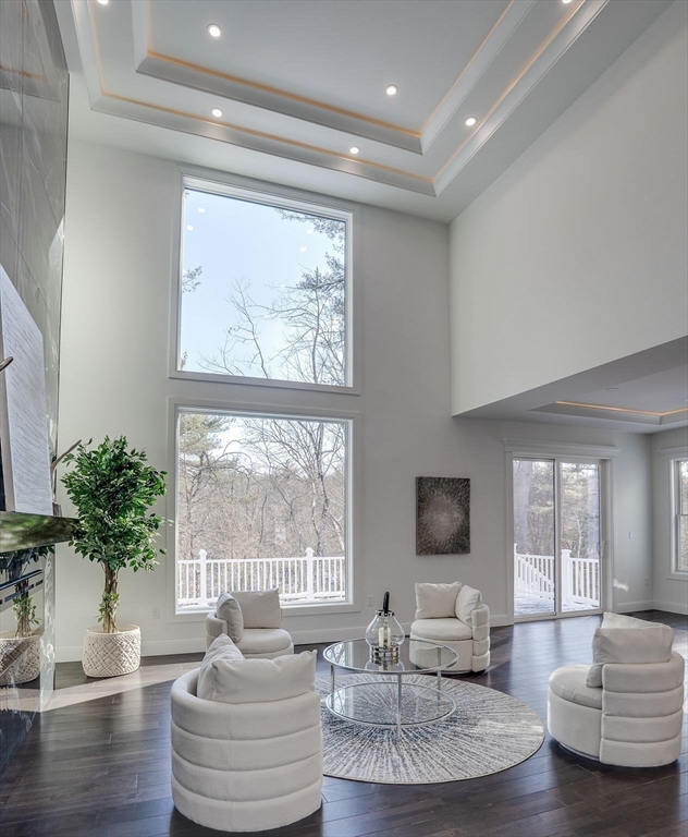 709 Main Street Acton, MA 01720 - Photo 13 of 42 a living room with furniture and a large window