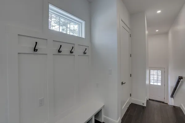 a view of a room with window and wooden floor