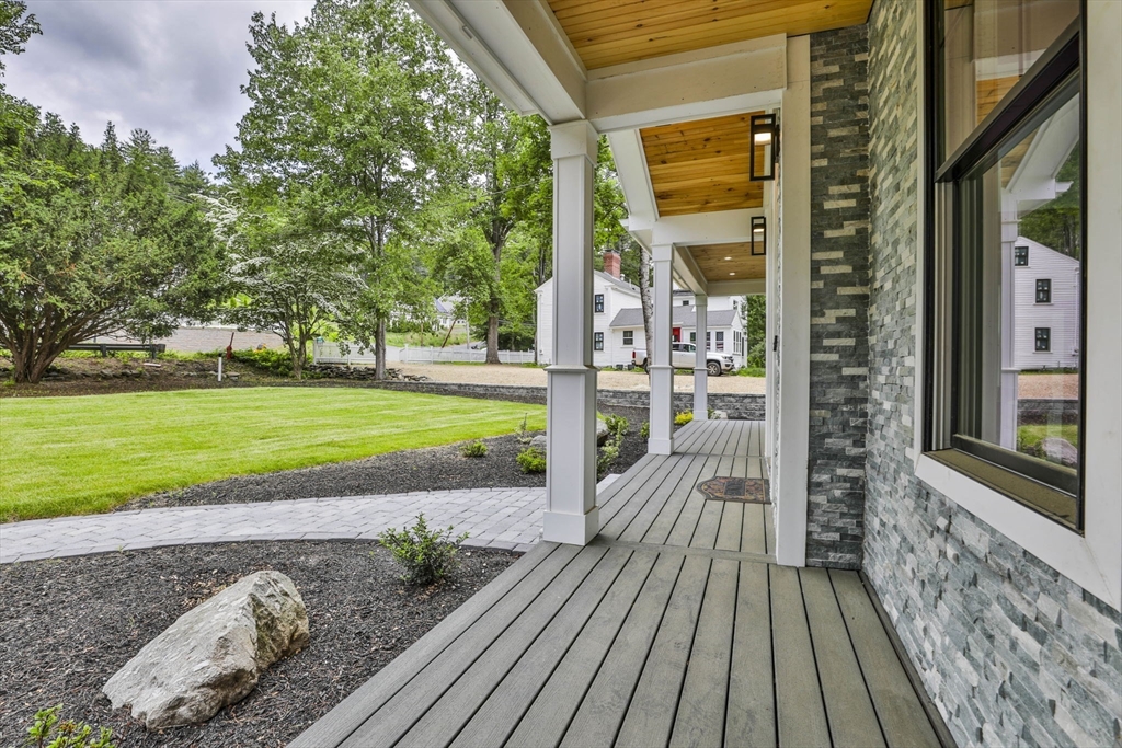 709 Main Street Acton, MA 01720 - Photo 2 of 42 a view of a house with a porch