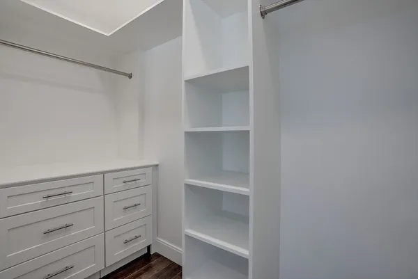 a view of an empty walk in closet