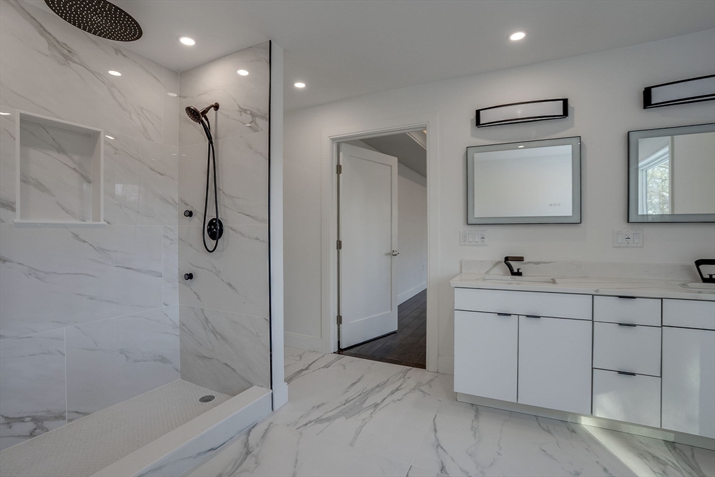 709 Main Street Acton, MA 01720 - Photo 31 of 42 a bathroom with a shower and a sink