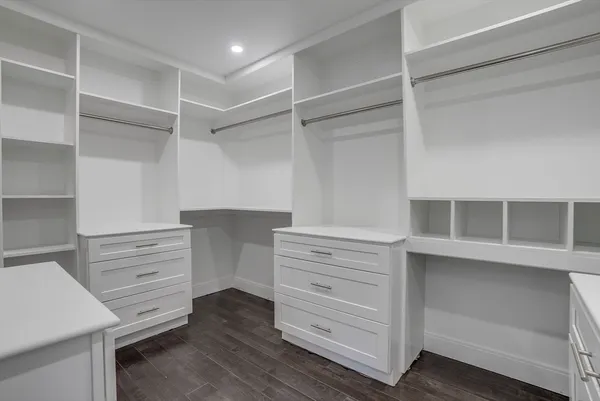 a view of an empty walk in closet