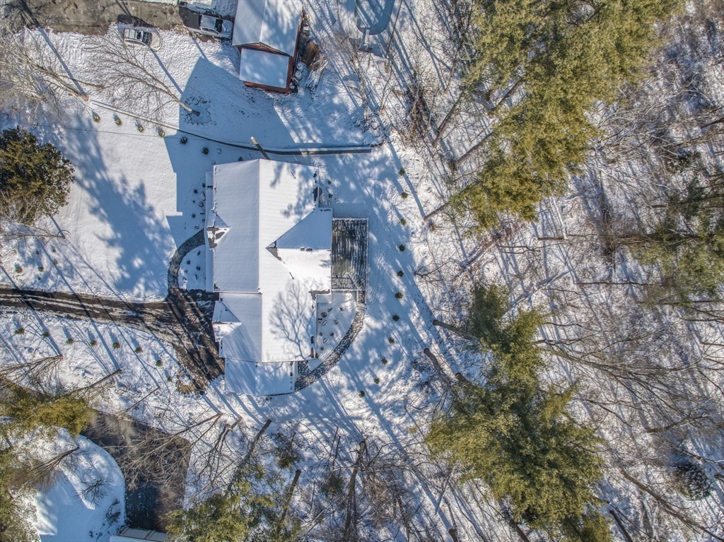 709 Main Street Acton, MA 01720 - Photo 40 of 42 a aerial view of a house with a yard