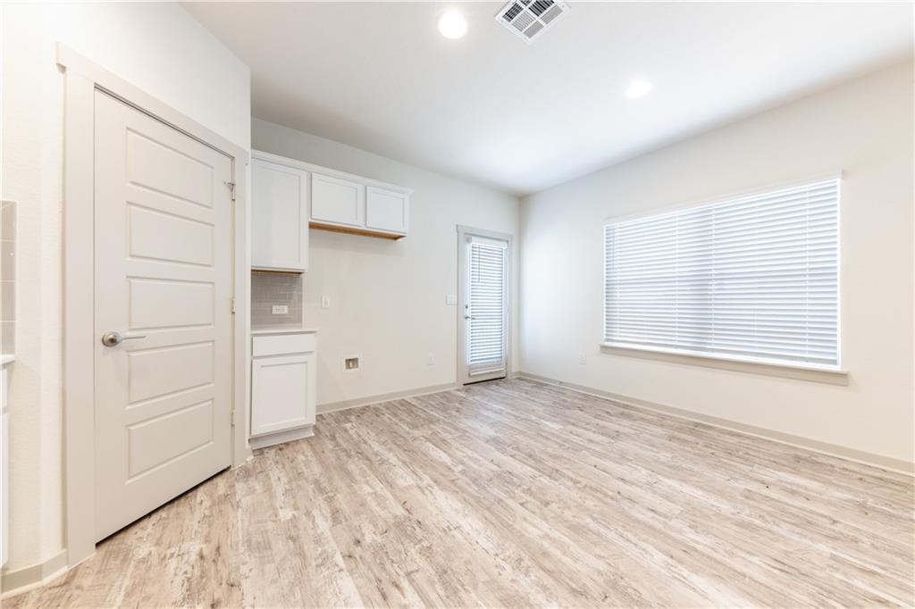 8304 Mimi Lane Austin, TX 78724 - Photo 13 of 32 a view of an empty room with a window