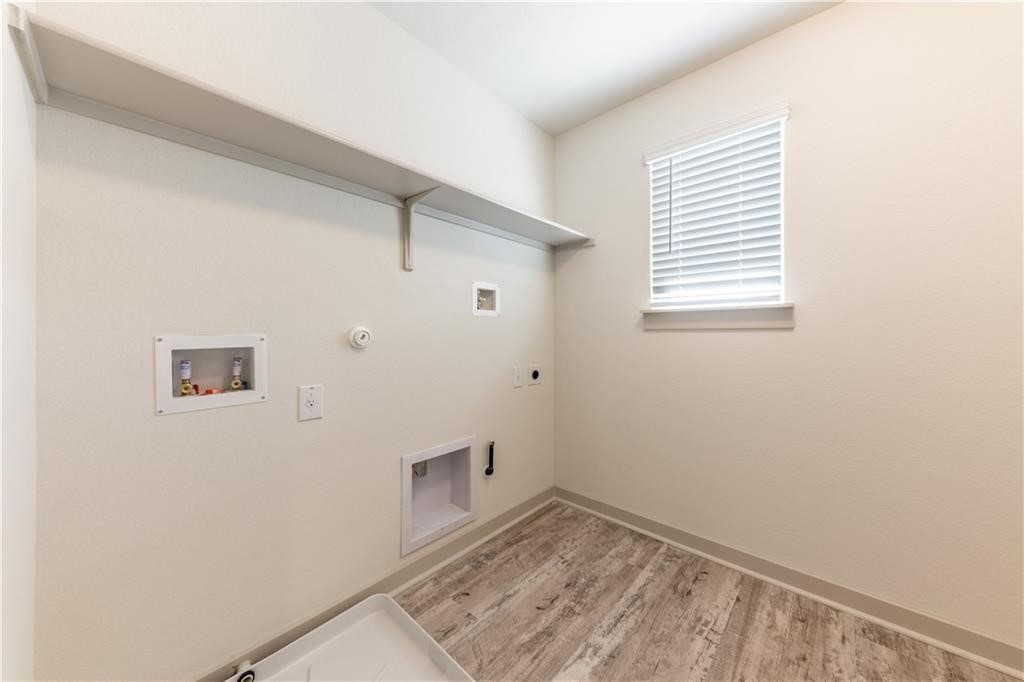 8304 Mimi Lane Austin, TX 78724 - Photo 18 of 32 a view of an empty room with a window