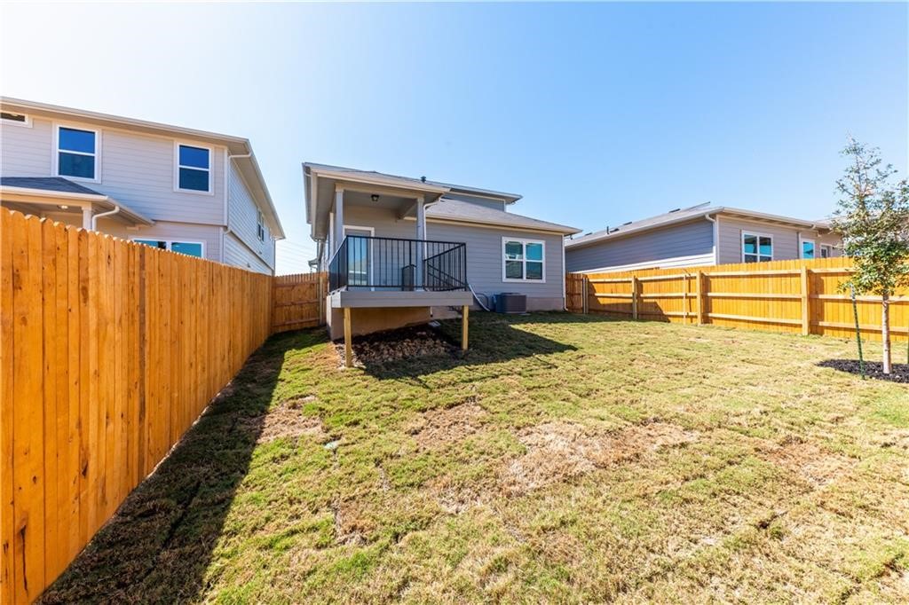 8304 Mimi Lane Austin, TX 78724 - Photo 21 of 32 a view of a house with a swimming pool