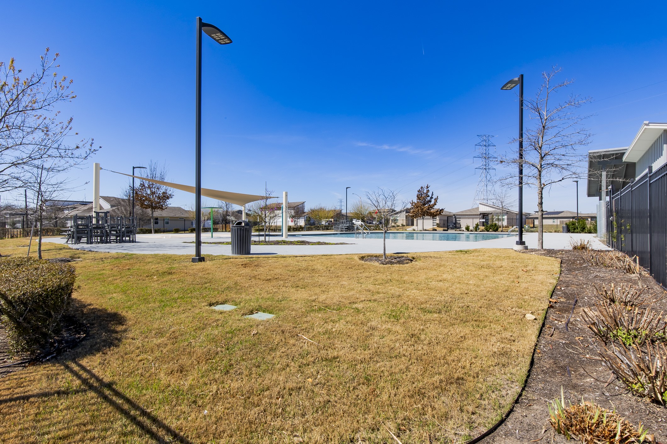 8304 Mimi Lane Austin, TX 78724 - Photo 25 of 32 a view of a swimming pool with a lake