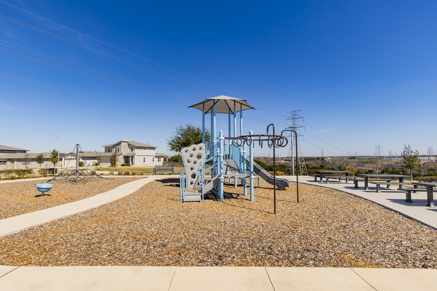 8304 Mimi Lane Austin, TX 78724 - Photo 30 of 32 a living room with furniture and a wooden floor