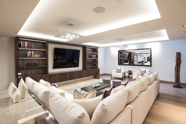 a kitchen with stainless steel appliances granite countertop a stove and a refrigerator