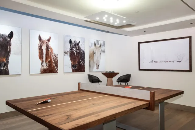 a view of a swimming pool with a lounge chair