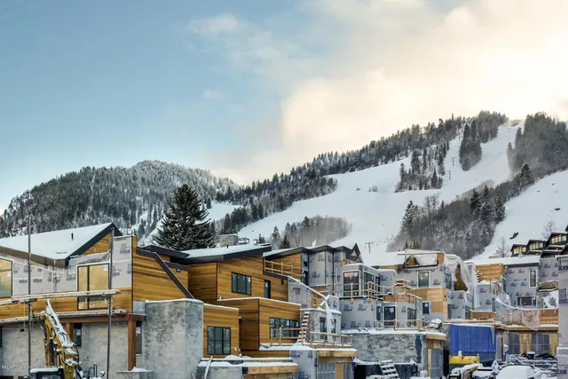 a view of a two chairs in the roof deck