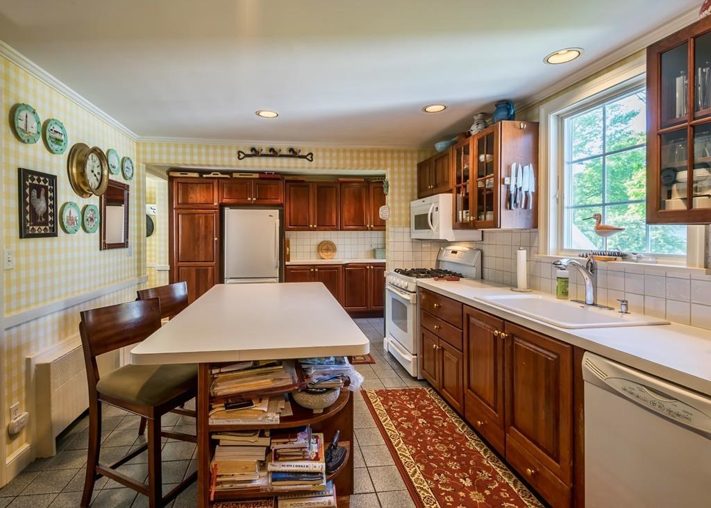 3 Rainbow Road Marblehead, MA 01945 - Photo 11 of 28 a kitchen with a sink stove and cabinets