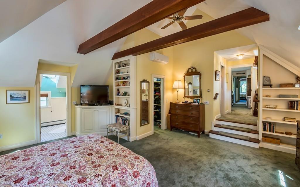 3 Rainbow Road Marblehead, MA 01945 - Photo 14 of 28 a bedroom with a bed and a flat screen tv