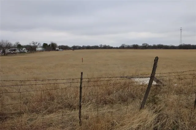 a view of a lake with a big yard