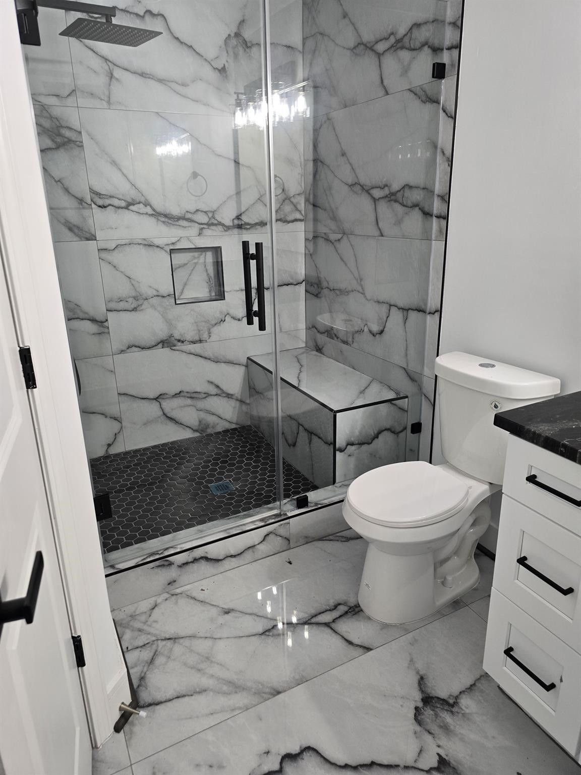 5821 Lantern Drive Beaumont, TX 77713 - Photo 12 of 17 a bathroom with a toilet and a shower