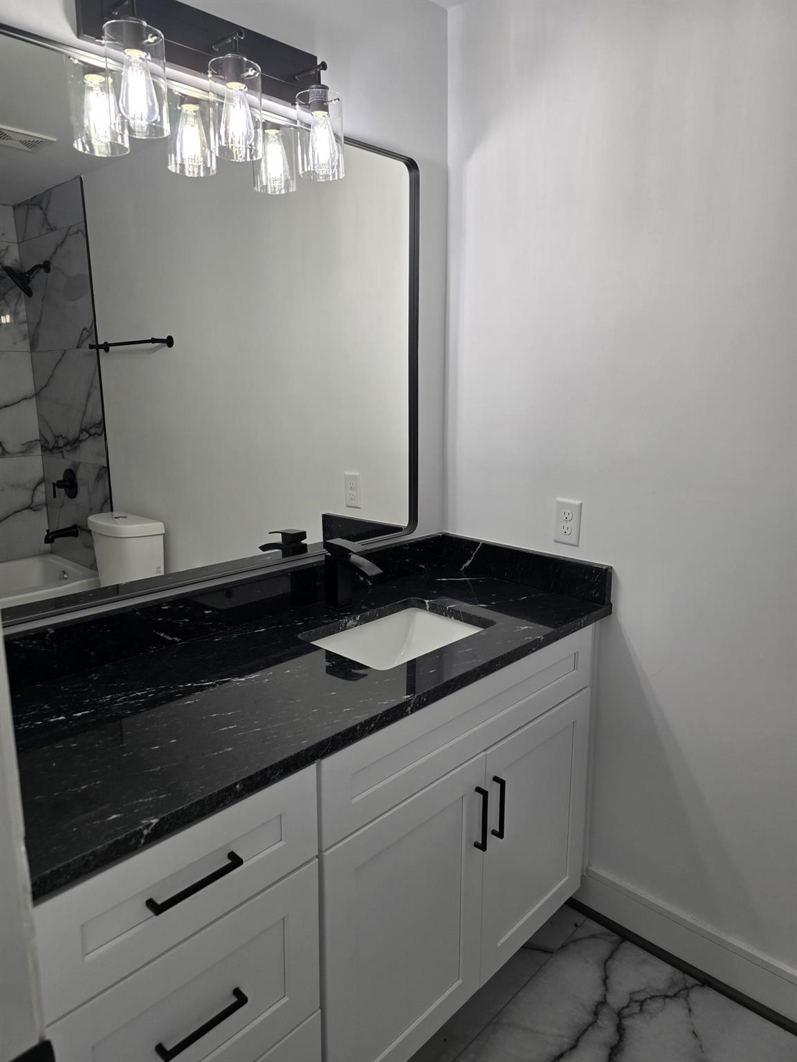 5821 Lantern Drive Beaumont, TX 77713 - Photo 13 of 17 a view of a sink and dishwasher in a kitchen