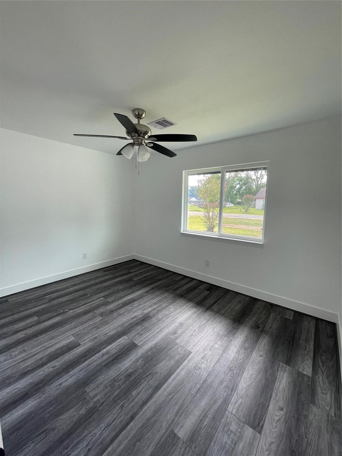 5821 Lantern Drive Beaumont, TX 77713 - Photo 16 of 17 wooden floor in an empty room